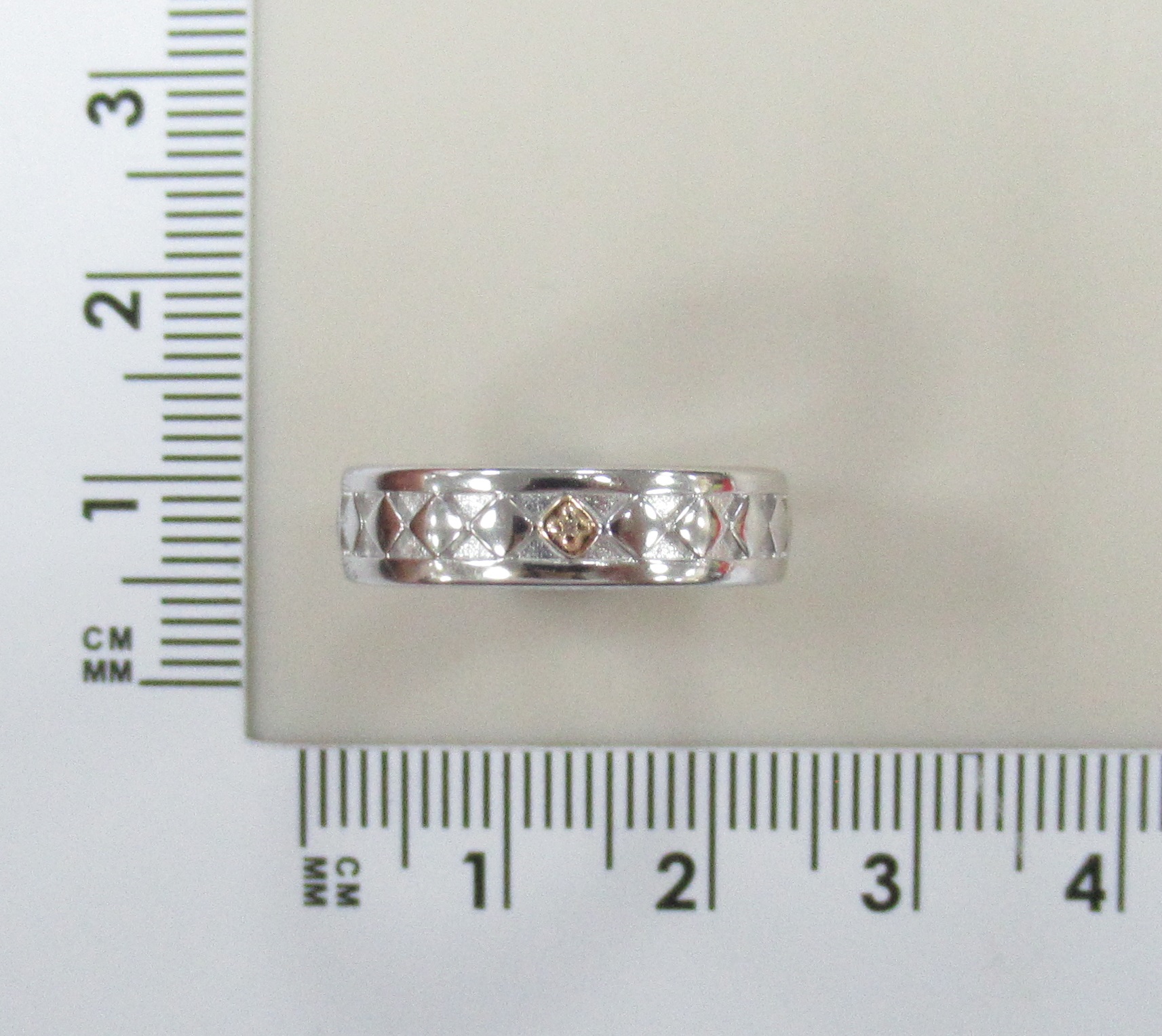 Серебряное кольцо с бриллиантом и золотом